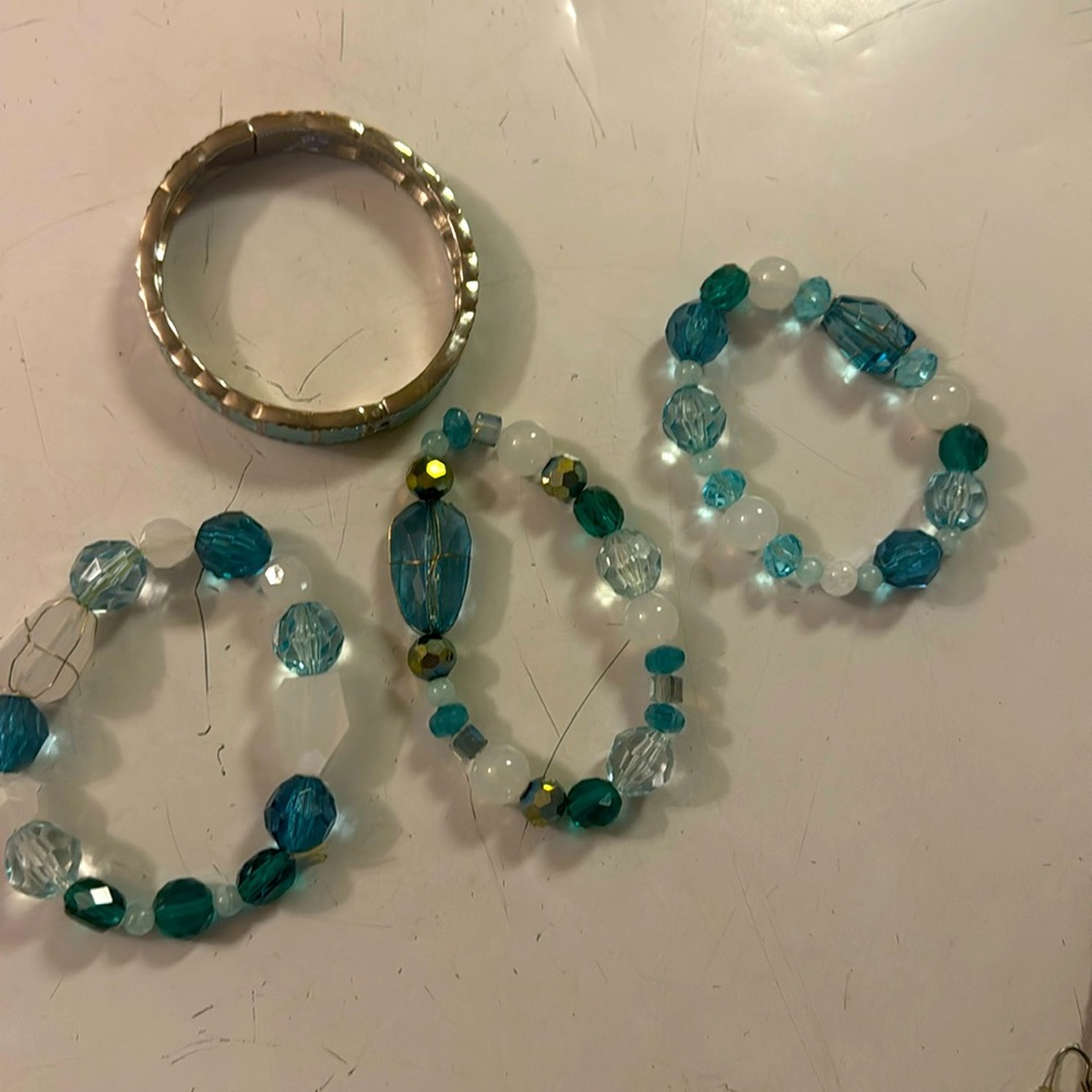 4 stretch bracelets. Sea green